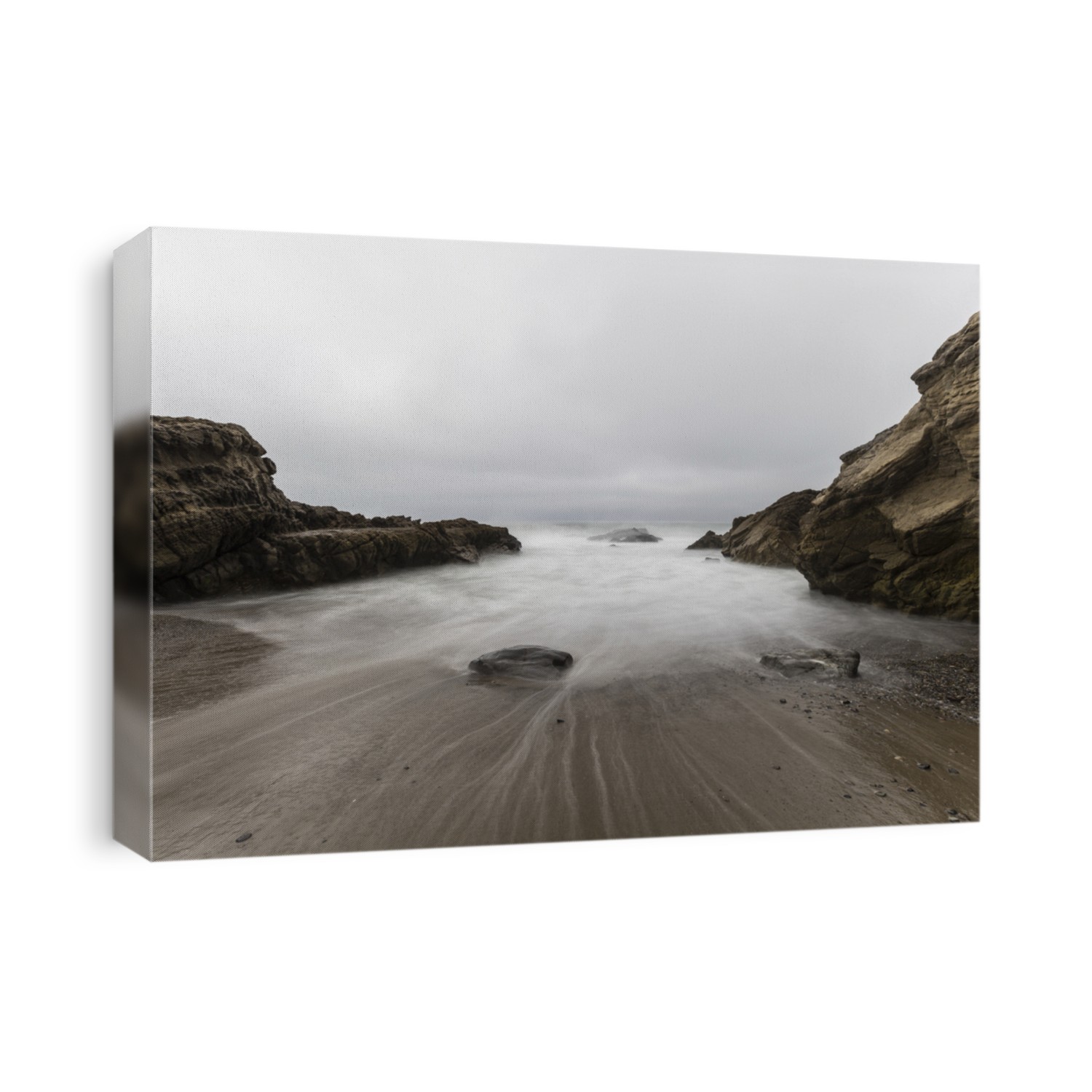 Rocky cove with motion blurred water at Leo Carrillo State Beach in Malibu, California.